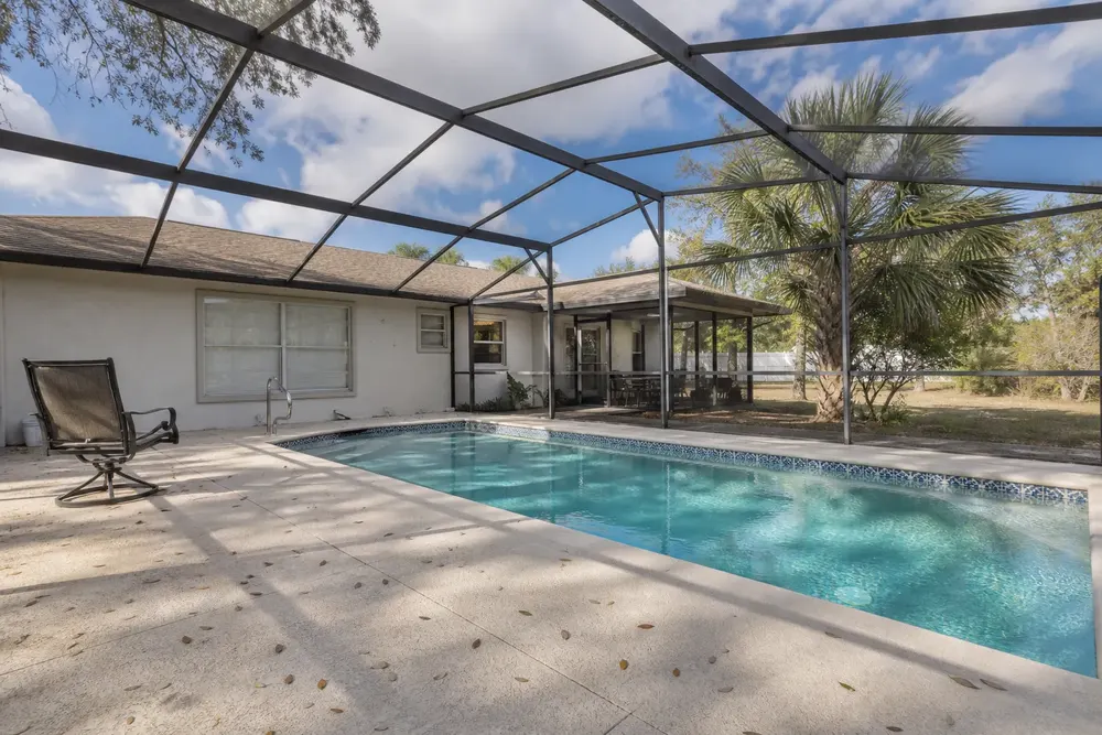 Clear screened pool ready for biweekly residential service in Florida